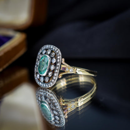 Emerald and Diamond Oval Cluster Halo Yellow Gold and Silver Ring | Antique Style