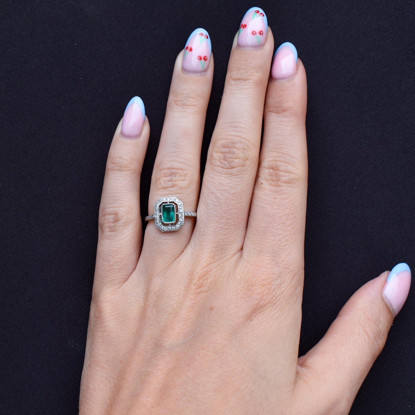 Art Deco Style Natural Emerald and Diamond Halo Platinum Ring