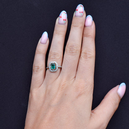 Art Deco Style Natural Emerald and Diamond Halo Platinum Ring