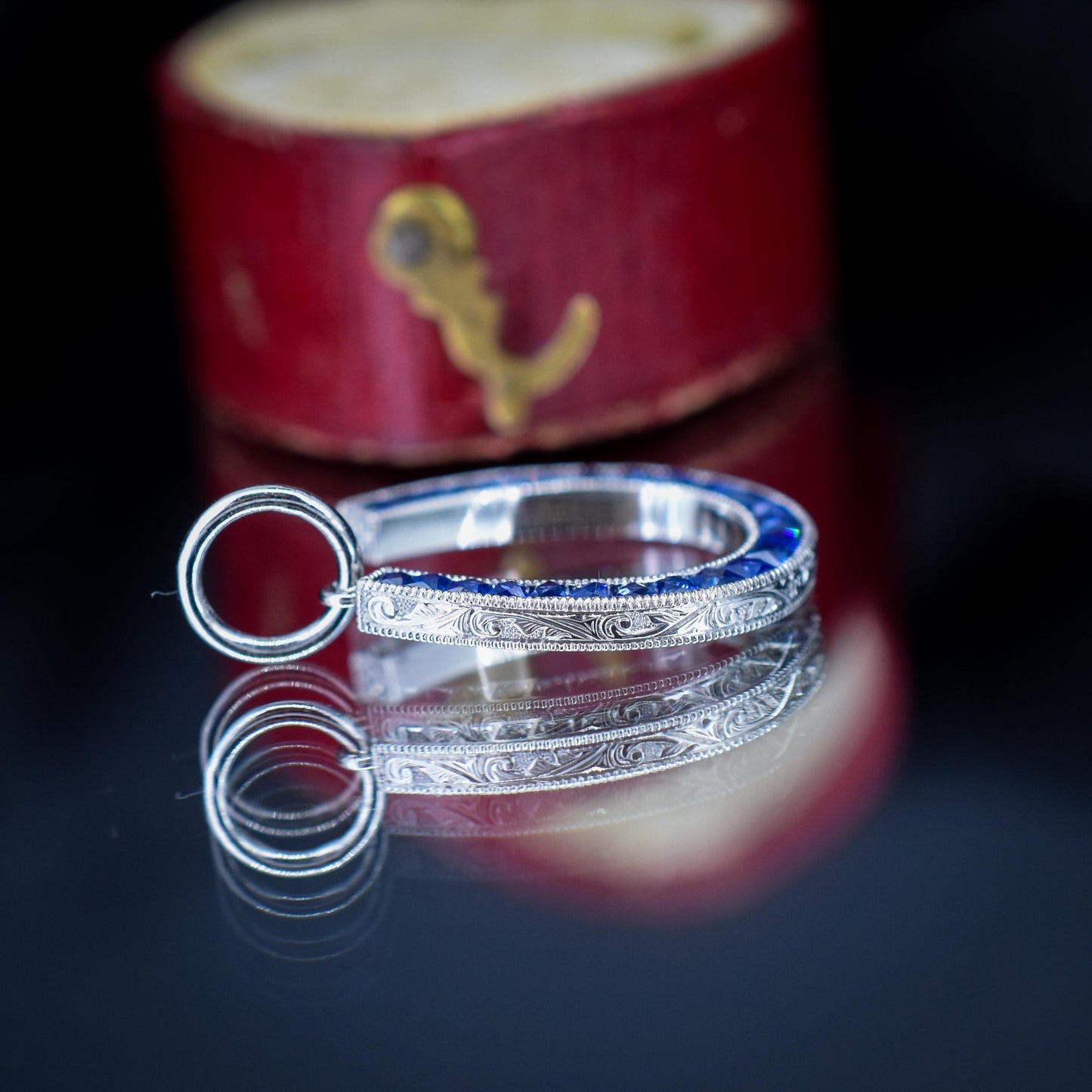 French Cut Royal Blue Sapphire Horseshoe Platinum Charm Pendant - 0.70ct