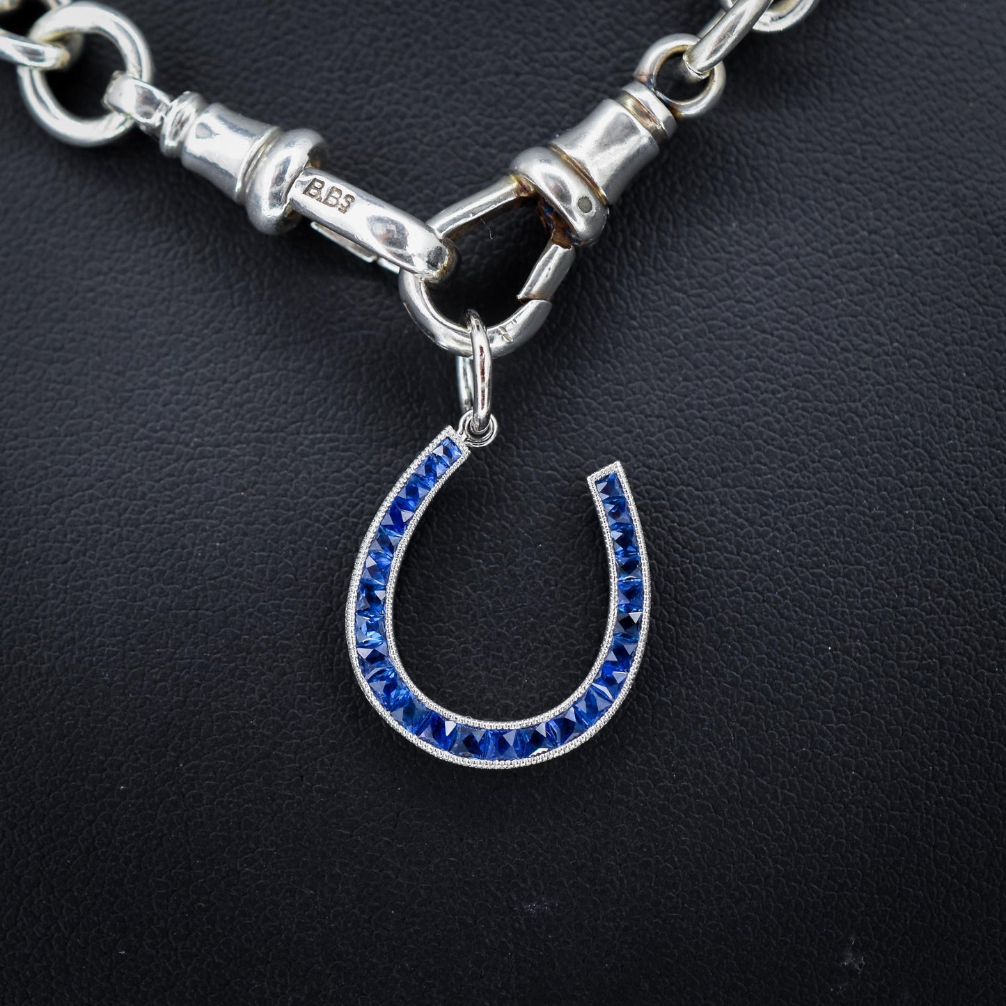 French Cut Royal Blue Sapphire Horseshoe Platinum Charm Pendant - 0.70ct