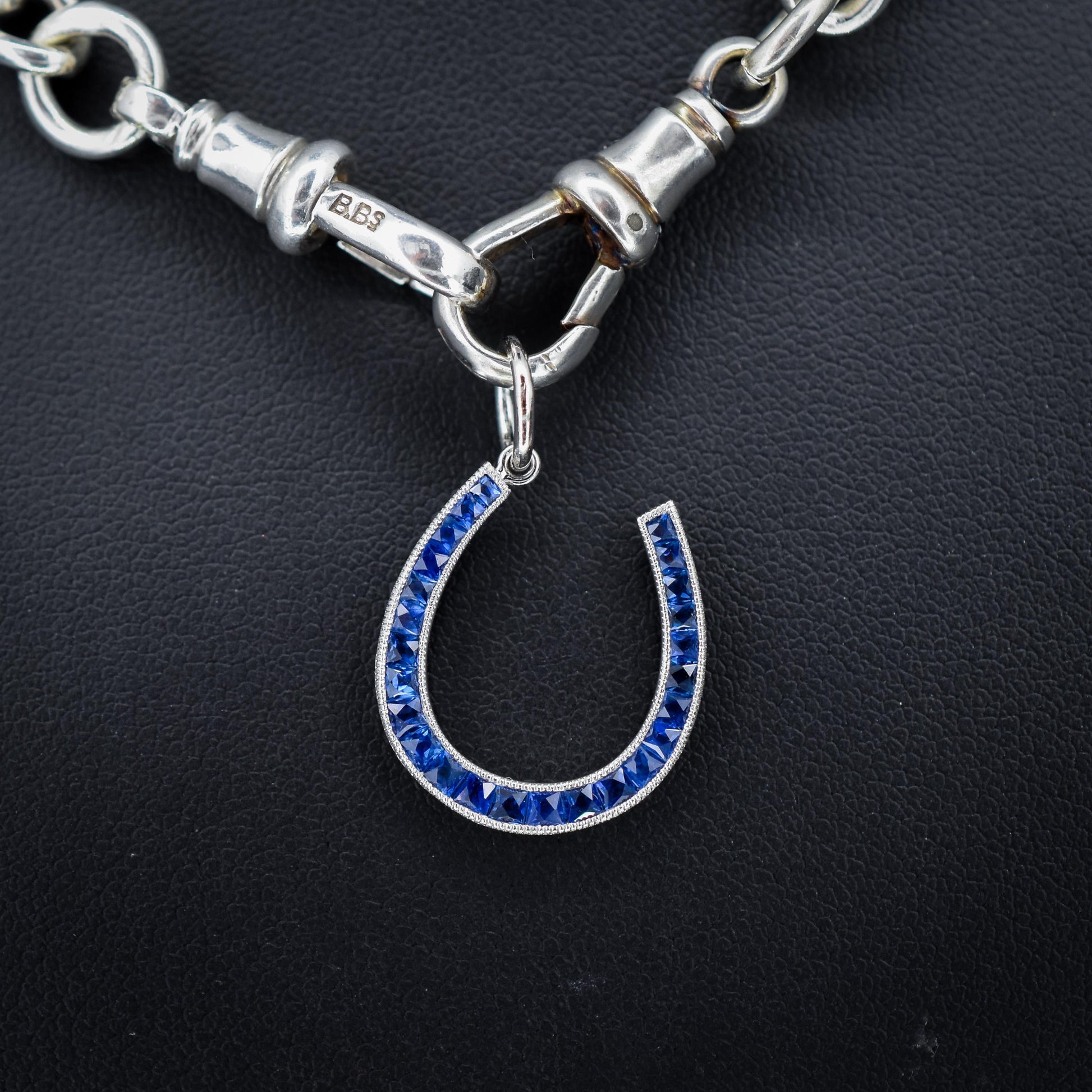 French Cut Royal Blue Sapphire Horseshoe Platinum Charm Pendant - 0.70ct