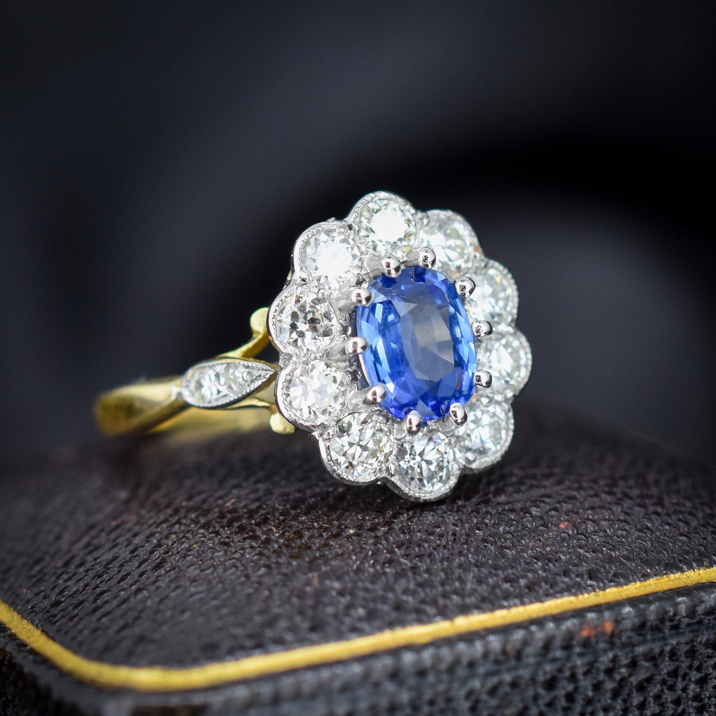 Edwardian Style 0.80ct Blue Sapphire and Diamond Oval Cluster Halo Ring