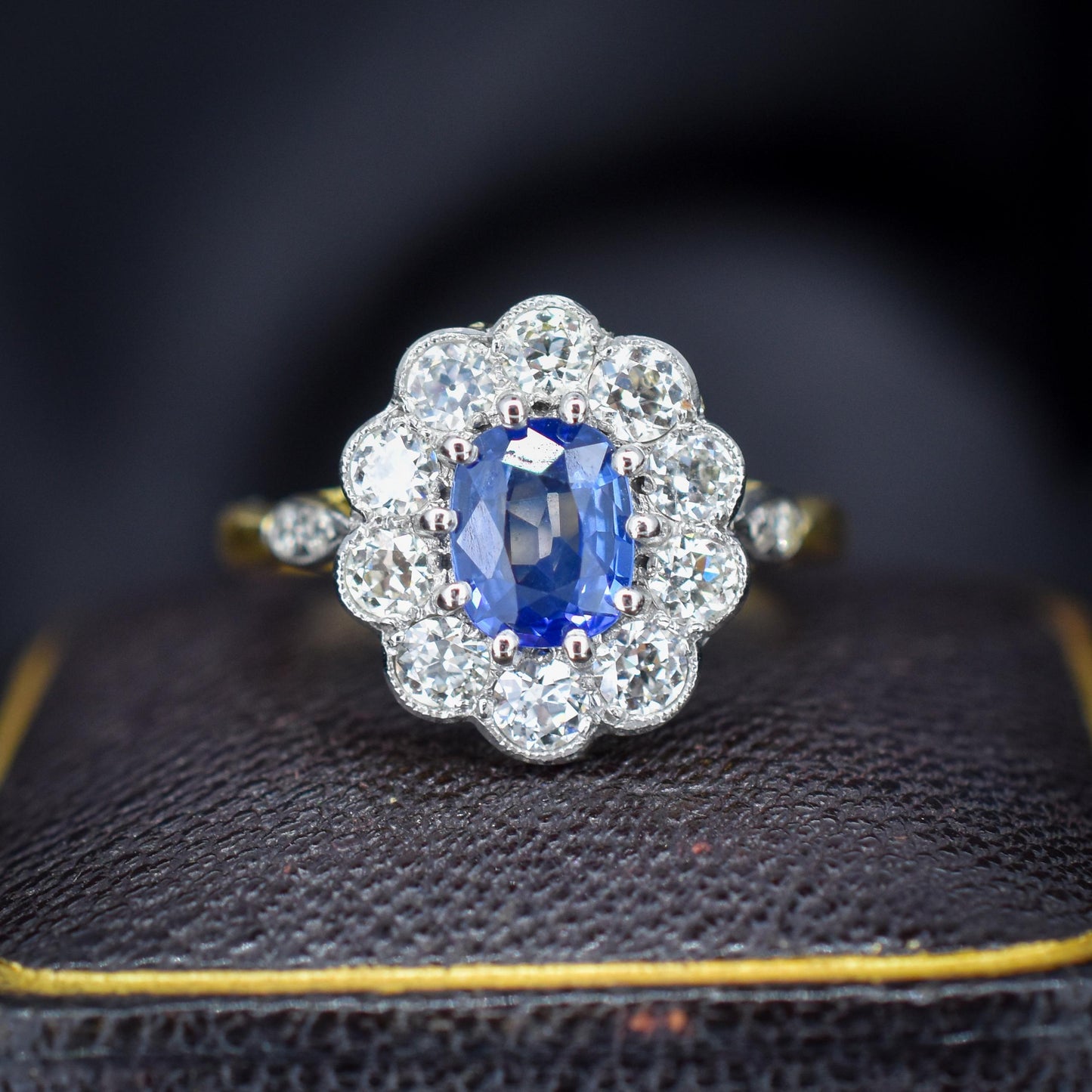 Edwardian Style 0.80ct Blue Sapphire and Diamond Oval Cluster Halo Ring