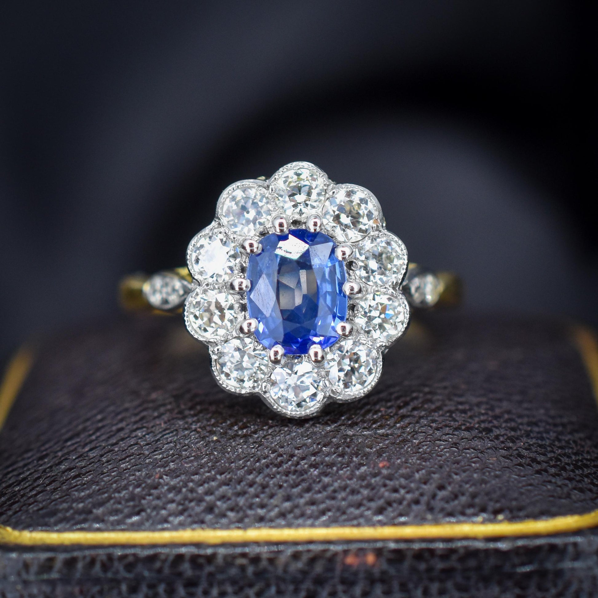 Edwardian Style 0.80ct Blue Sapphire and Diamond Oval Cluster Halo Ring