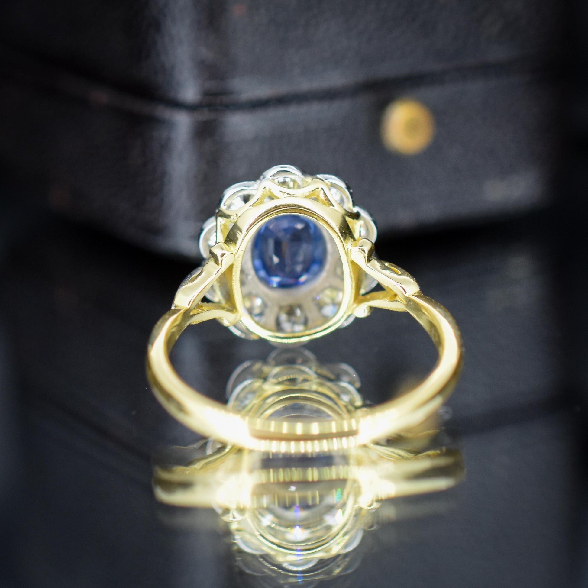 Edwardian Style 0.80ct Blue Sapphire and Diamond Oval Cluster Halo Ring