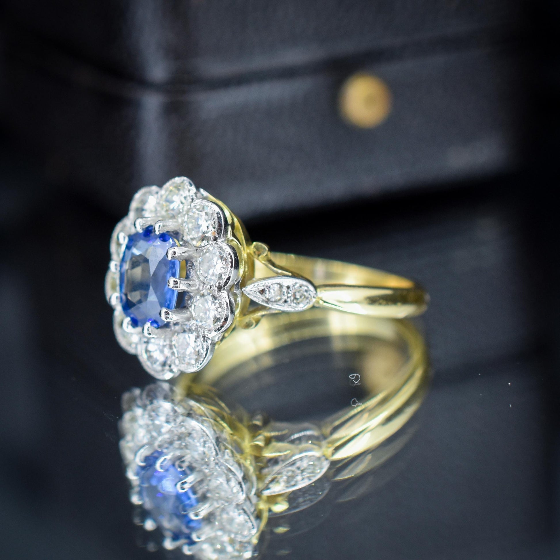 Edwardian Style 0.80ct Blue Sapphire and Diamond Oval Cluster Halo Ring