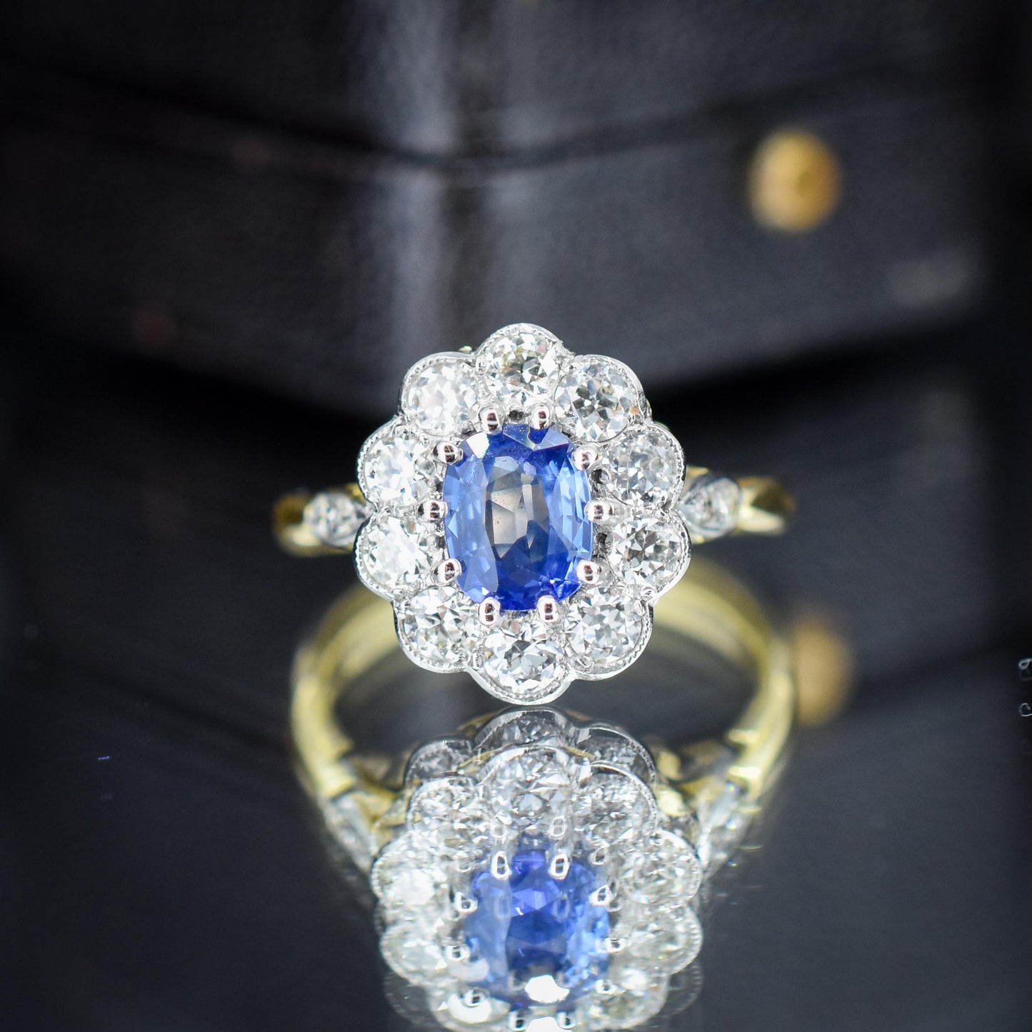 Edwardian Style 0.80ct Blue Sapphire and Diamond Oval Cluster Halo Ring