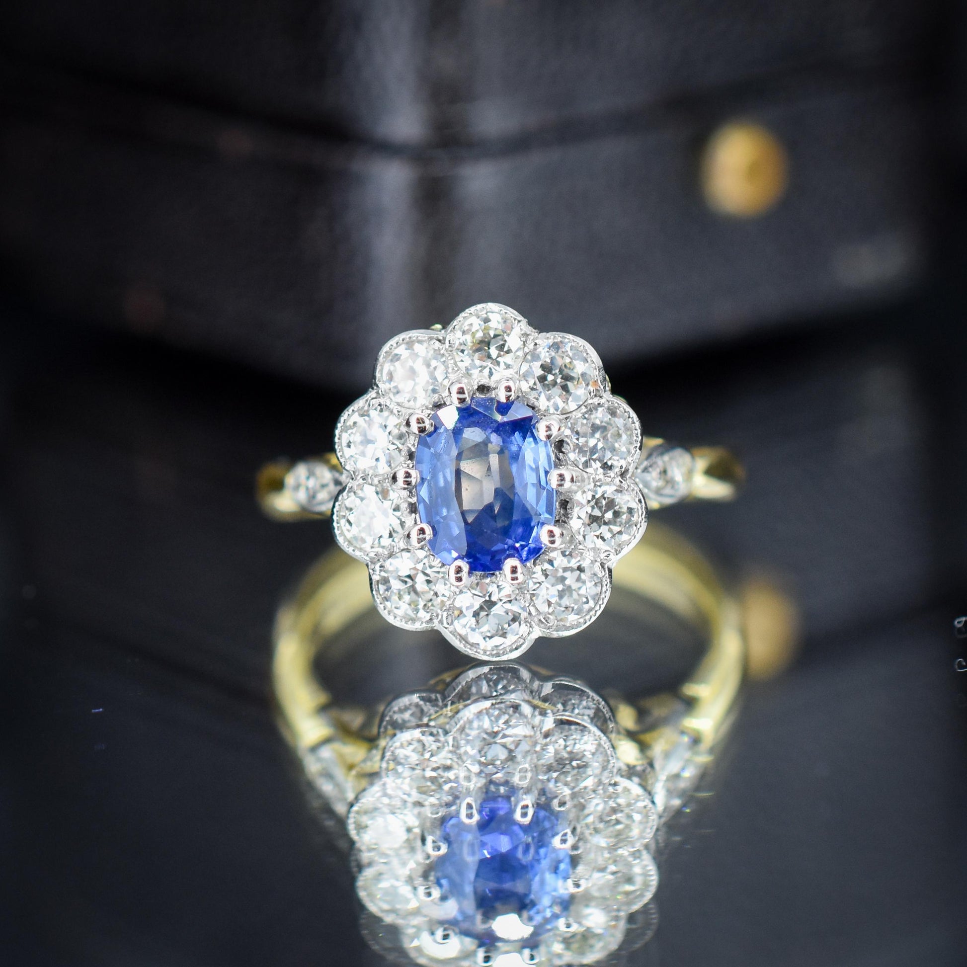 Edwardian Style 0.80ct Blue Sapphire and Diamond Oval Cluster Halo Ring