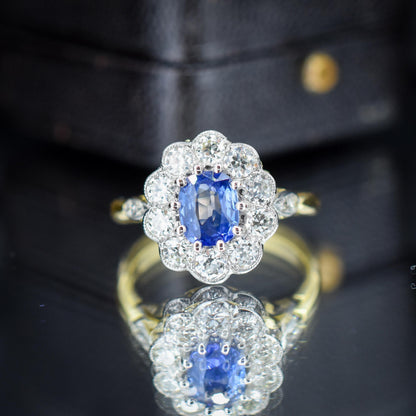 Edwardian Style 0.80ct Blue Sapphire and Diamond Oval Cluster Halo Ring