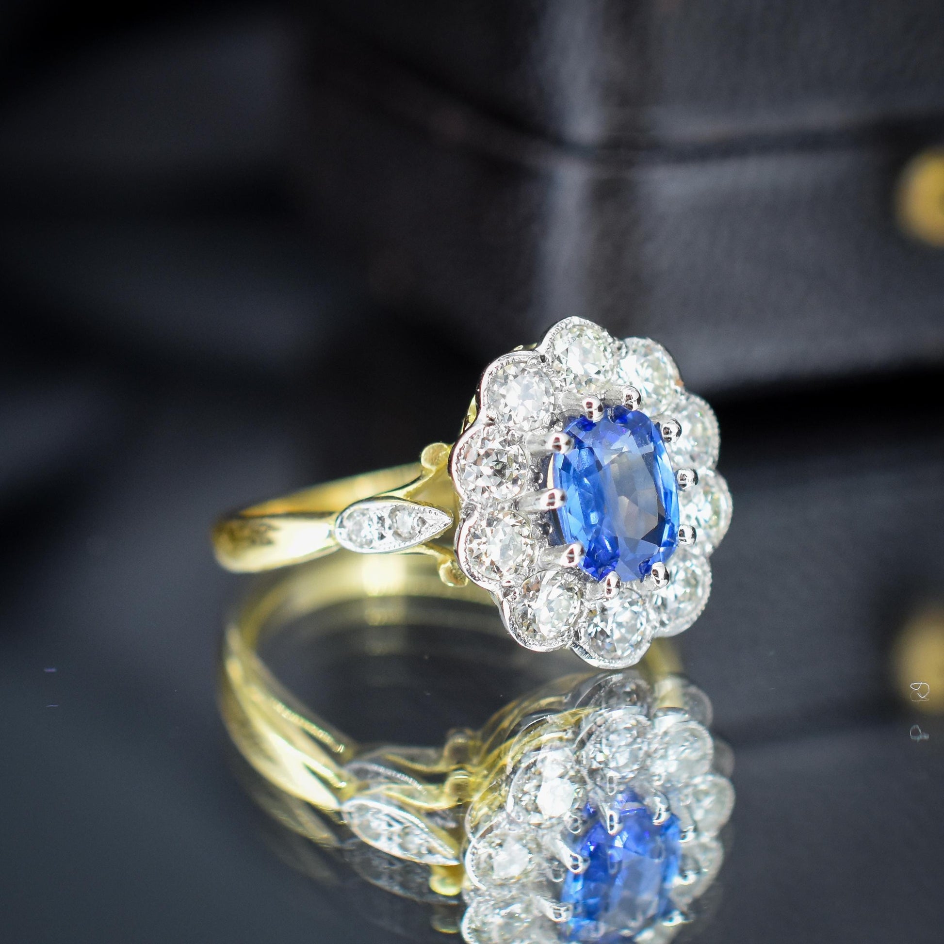 Edwardian Style 0.80ct Blue Sapphire and Diamond Oval Cluster Halo Ring