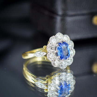Edwardian Style 0.80ct Blue Sapphire and Diamond Oval Cluster Halo Ring