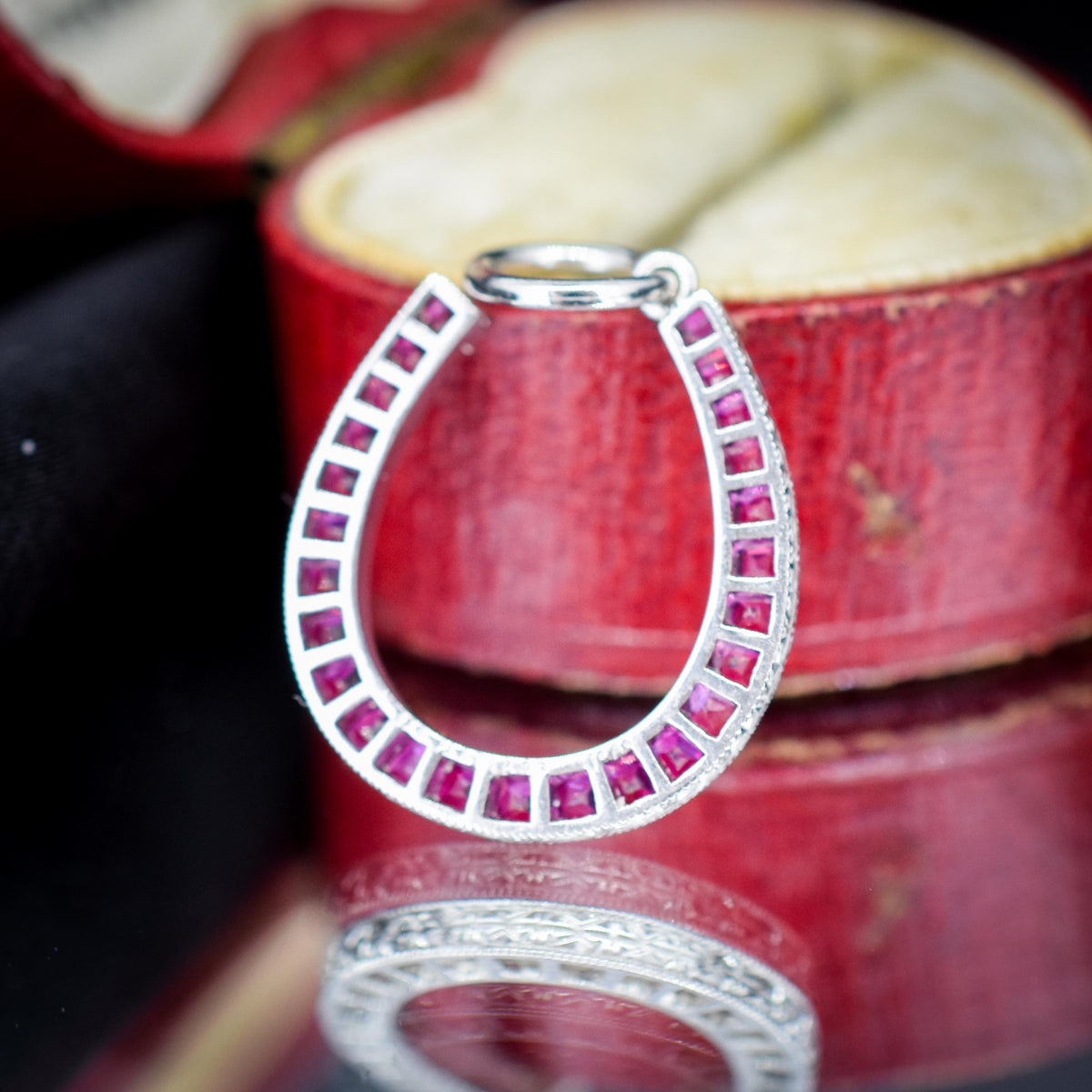 French Cut Ruby Horseshoe Platinum Charm Pendant - 0.70ct