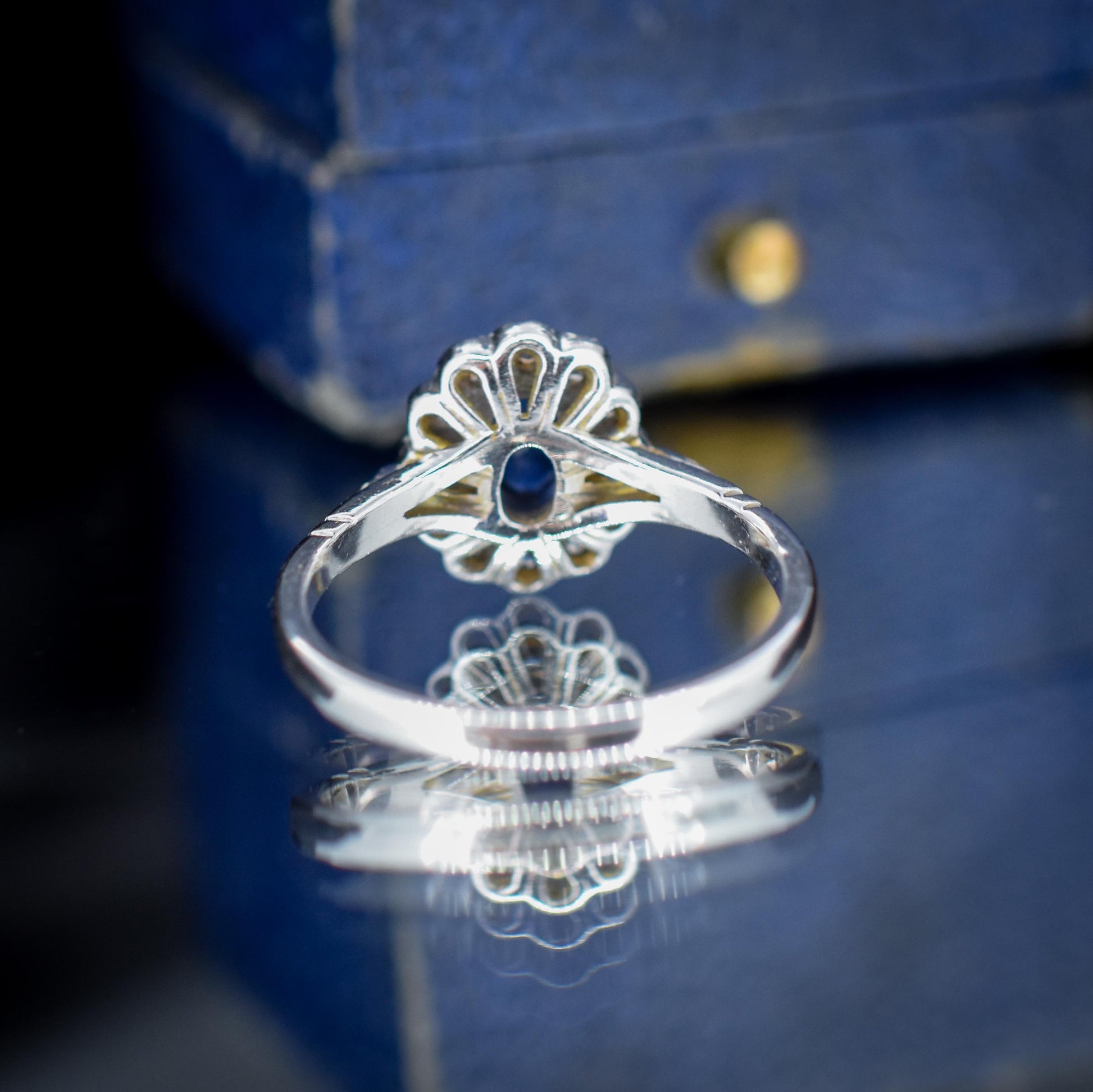 Blue Sapphire and Diamond Oval Cluster Halo 18ct White Gold Ring