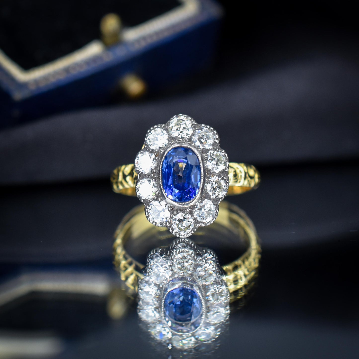 0.88ct Blue Sapphire and Diamond Oval Cluster 18ct Gold Ring