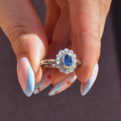 Blue Sapphire and Diamond Oval Cluster Halo 18ct White Gold Ring