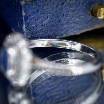 Blue Sapphire and Diamond Oval Cluster Halo 18ct White Gold Ring