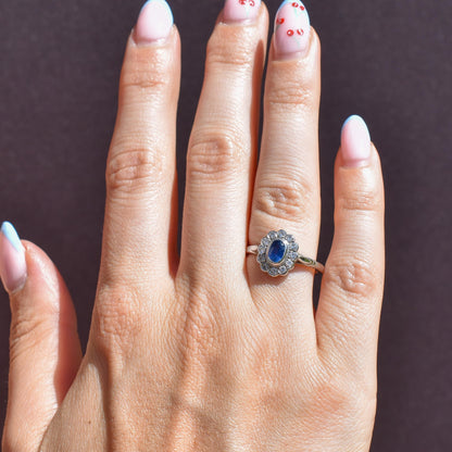 Blue Sapphire and Diamond Oval Cluster Halo 18ct White Gold Ring