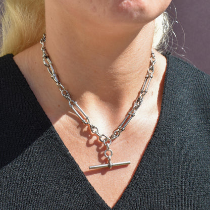 Antique '1902' Sterling Silver Trombone and Love Knot Albert Chain Necklace | 15.5"