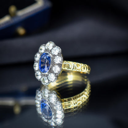 0.88ct Blue Sapphire and Diamond Oval Cluster 18ct Gold Ring