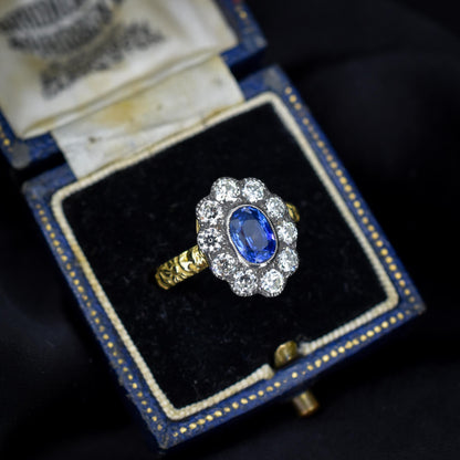 0.88ct Blue Sapphire and Diamond Oval Cluster 18ct Gold Ring