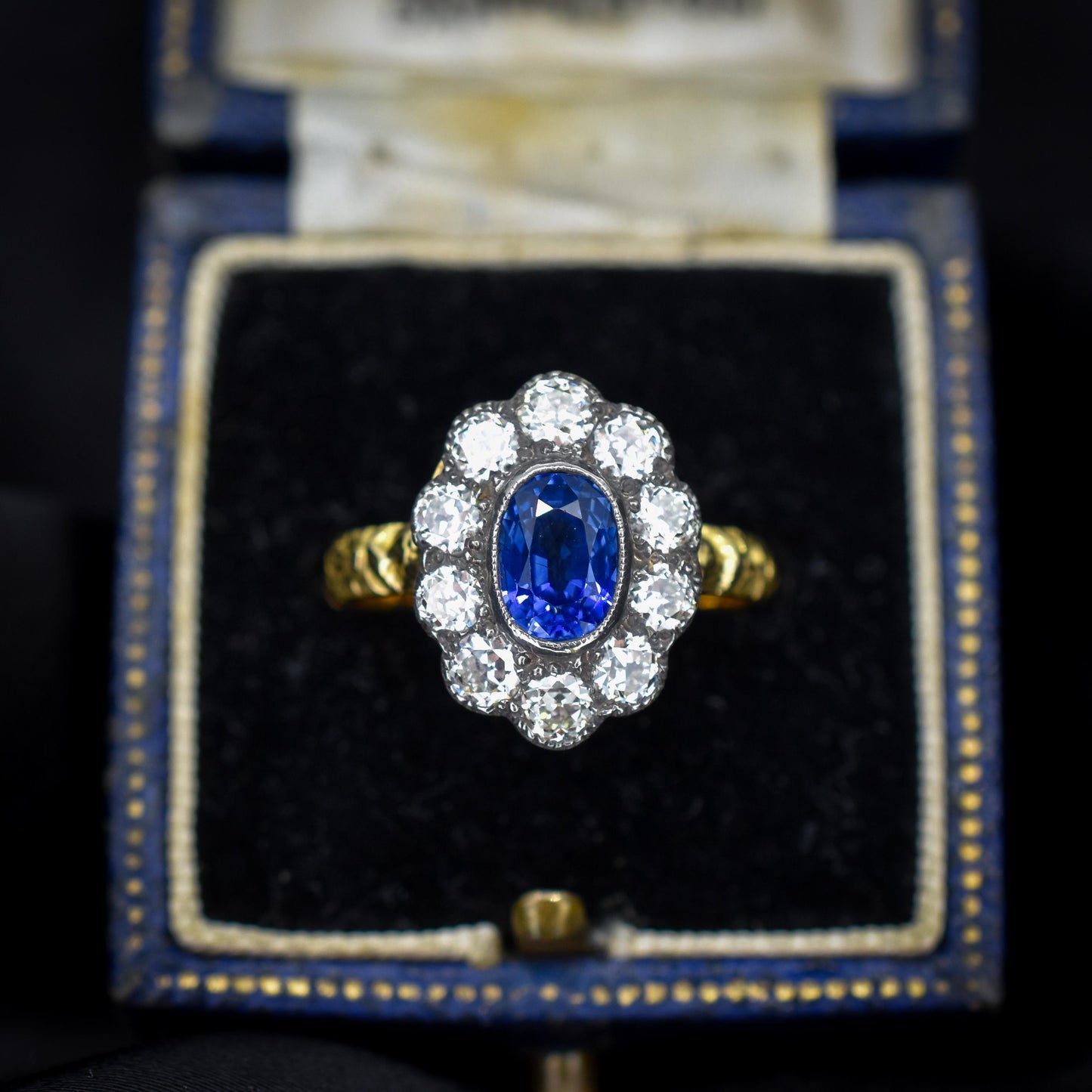 0.88ct Blue Sapphire and Diamond Oval Cluster 18ct Gold Ring
