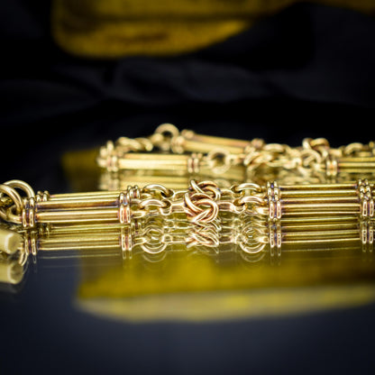 Antique 17" 18ct Yellow Gold Trombone and Love Knot Albert Chain Necklace