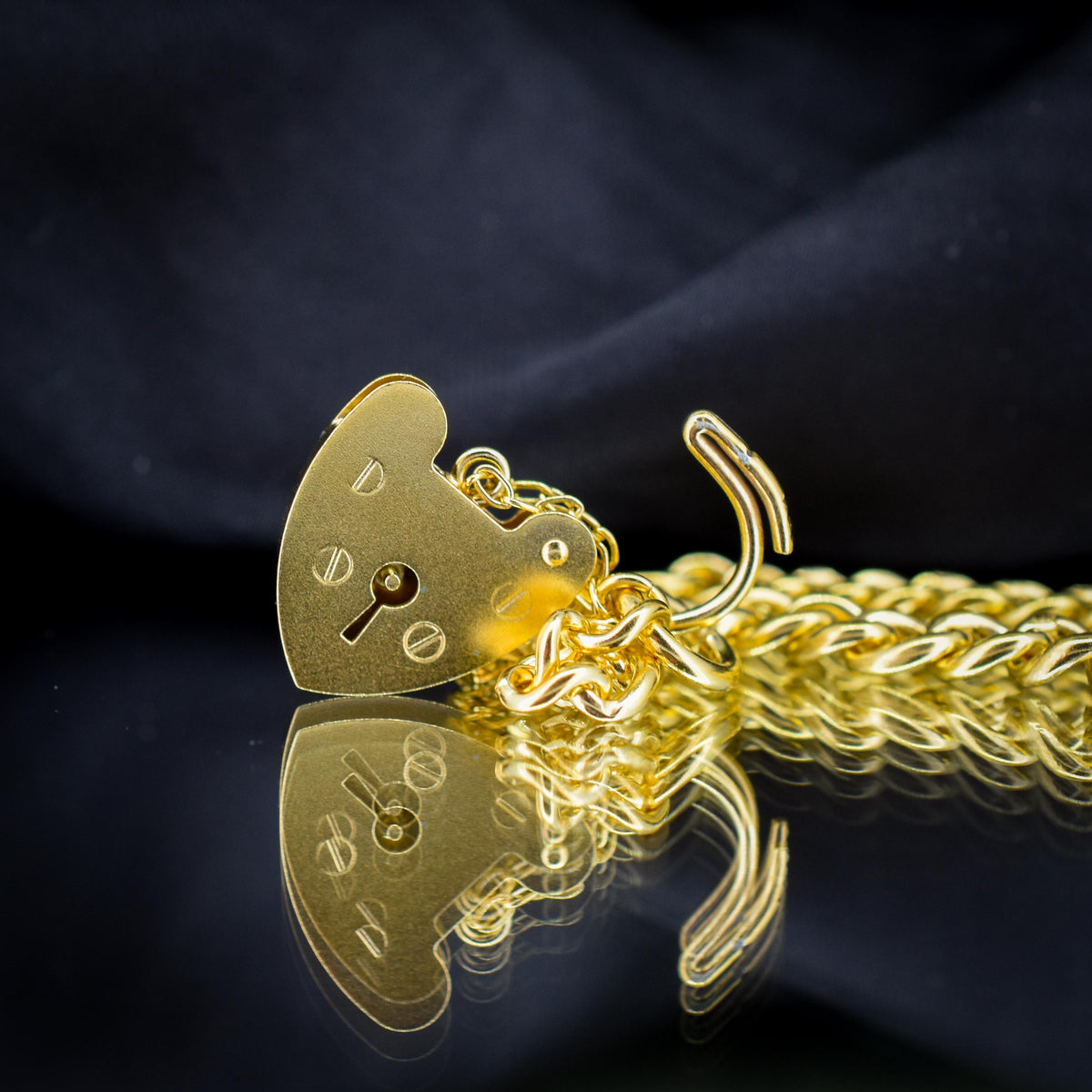 Antique Graduated Curb Gold on Silver Bracelet with Heart Padlock | 7"