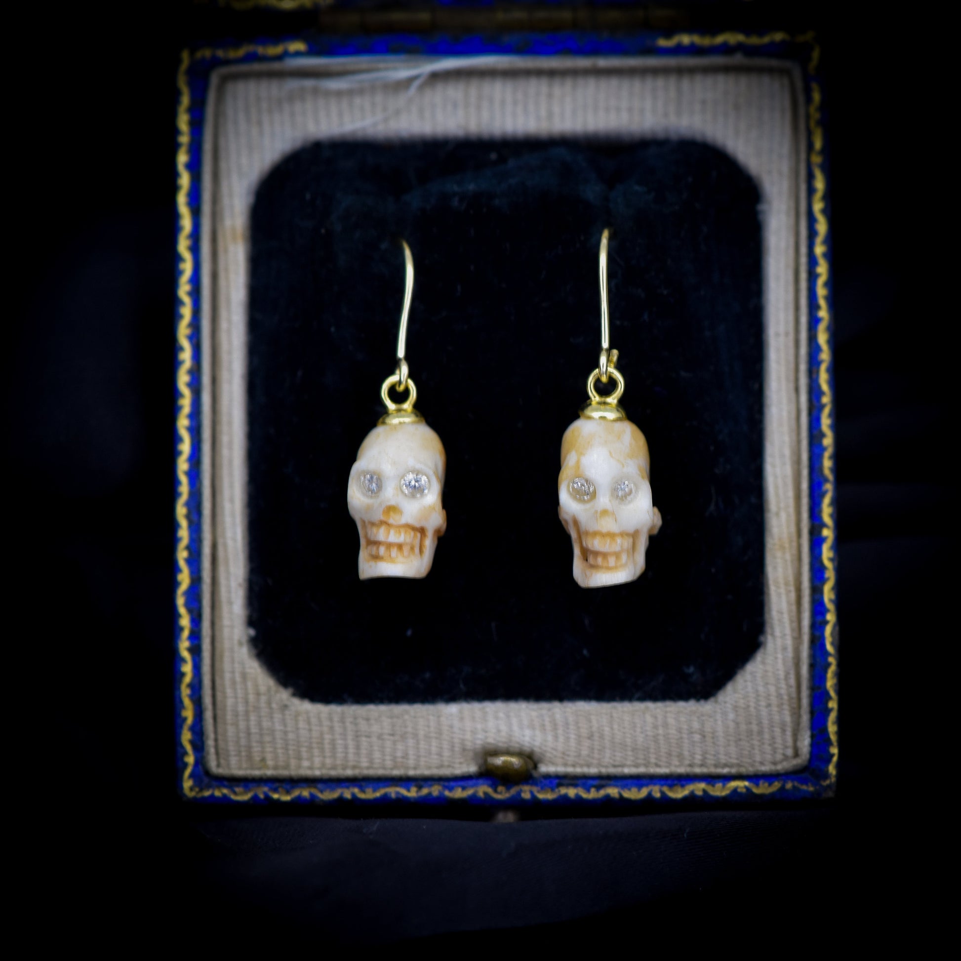 Carved Skull with Diamond Eyes Gold Drop Earrings