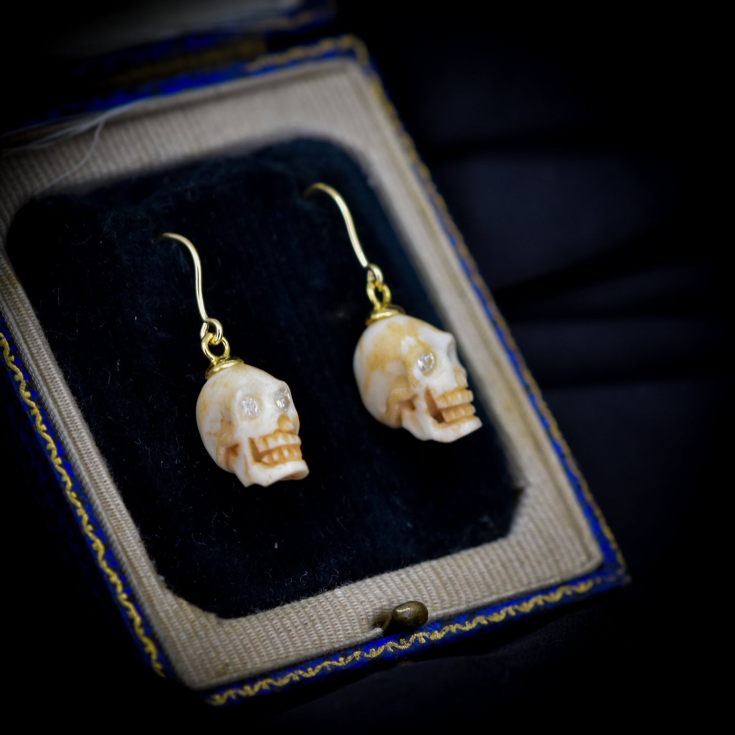 Carved Skull with Diamond Eyes Gold Drop Earrings