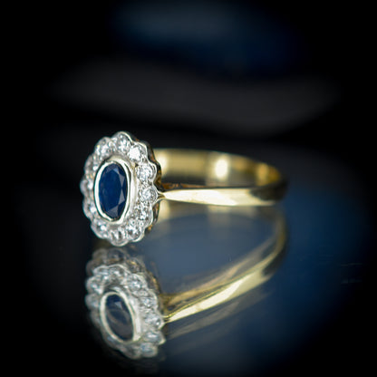 Vintage Blue Sapphire and Diamond Oval Cluster Halo Gold Ring