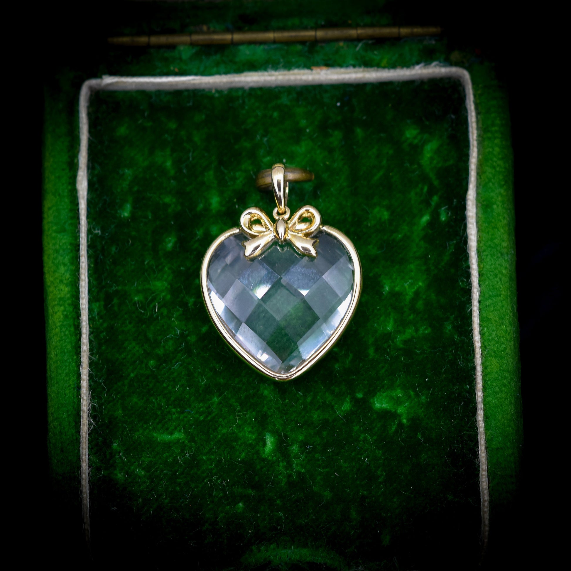 Faceted Rock Crystal Heart Bow Gold Pendant